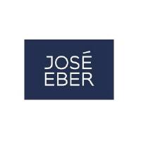 José Eber logo on blue background.